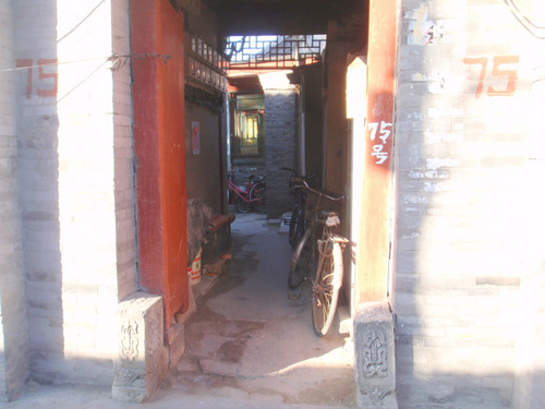 A peek into a Hutong Gate or Gateway, and the remaining Court Yard.